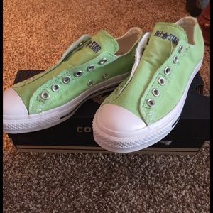 Mint green Converse slip ons